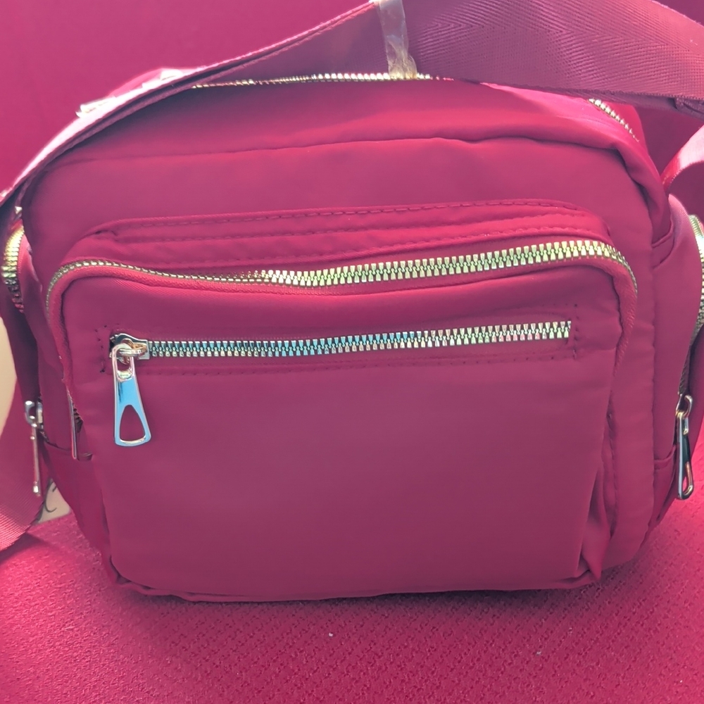Stylish Pink Crossbody Bag with Front Zip Pocket